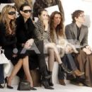Victoria Beckham and L'Wren Scott attend the Chanel fashion show during Paris Fashion Week (Haute Couture) Spring/Summer 2006 on January 24, 2006 in Paris, France - 454 x 348