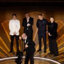 Daniel Brühl, Edward Berger, Malte Grunert, Albrecht Schuch and Felix Kammerer - The 95th Annual Academy Awards  (2023) - 454 x 556