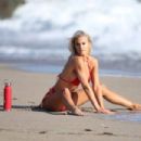 Brennah Black – In red bikini on photoshoot  for 138 Water in Malibu - 454 x 303