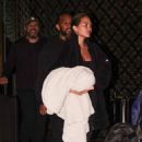 Chrissy Teigen – With John Legend check out of their New York hotel