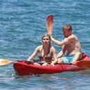 Jennette McCurdy wearing a pretty bikini and board shorts was spotted kayaking with a male friend in Maui