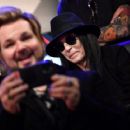 Rikki Rockett of Poison attends the press conference for THE STADIUM TOUR DEF LEPPARD - MOTLEY CRUE - POISON at SiriusXM Studios on December 04, 2019 in Los Angeles, California - 454 x 362