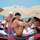 Celeste Bright – in a black bikini at the beach in Miami - 454 x 681