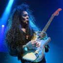 Yngwie Malmsteen performs during the Generation Axe show at The Joint inside the Hard Rock Hotel & Casino on November 9, 2018 in Las Vegas, Nevada - 454 x 550