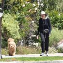 Marcia Cross – walking her dog in Los Angeles - 454 x 427