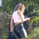 Addison Rae – Steps out in skin-tight leather pants - FamousFix