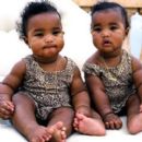 Puff Daddy and Kim Porter  their twins - 400 x 403