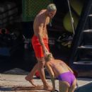 Caroline Stanbury – Seen In a purple bikini with her husband Sergio Carrallo at Mykonos - 454 x 681