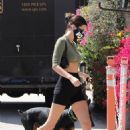 Kendall Jenner – Spotted with her doberman at Sunlife Organics in Malibu