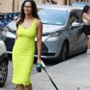 Padma Lakshmi- Seen in a neon green dress while out in Manhattan
