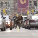 Kar (Seann William Scott) and the Monk (Chow Yun Fat) run through the streets to avoid pursuers - 454 x 296