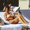 Jocelyn Chew – In white bikini on the beach in Miami - 454 x 285