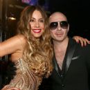 Sofia Vergara and Pitbull - The 58th GRAMMY Awards - Backstage And Audience - 454 x 594