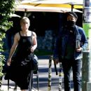 Amber Heard – In a black dress with a friend in Los Feliz