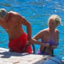 Caroline Stanbury – Seen In a purple bikini with her husband Sergio Carrallo at Mykonos - 454 x 303