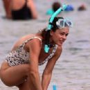 Rachel Bilson – In a one piece swimsuit on the beach in Hawaii