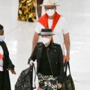 Cyndi Lauper – With husband David Thornton arrive at JFK Airport in New York - 454 x 736