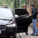 Taylor Swift and Joe Alwyn leaving a restaurant in London