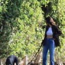 Kendall Jenner – With her Doberman Pinscher out for a walk in Beverly Hills