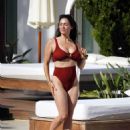 Casey Batchelor – In a brown bikini as she is seen on holiday in Ibiza - 454 x 681