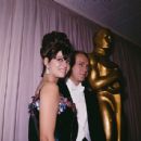 Claudia Cardinale and Steve McQueen  - The 37th Annual Academy Awards (1965) - 454 x 438