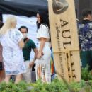 Katy Perry – In a white skirt and crop top filming ‘American Idol’ in Maui