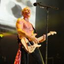 Phil Collen - During Def Leppard’s performance at the Cruzan Amphitheatre in West Palm Beach, Florida on June 15, 2011 - 408 x 612