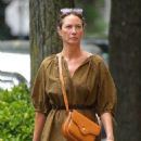 Christy Turlington was seen enjoying a refreshing seltzer drink while out and about in New York - 454 x 681