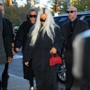 Kim Kardashian – Dressed in a black trench coat at Ritz Carlton hotel in New York