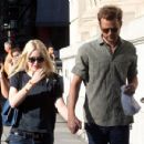 A smitten looking Dakota Fanning and her boyfriend Jamie Strachan go hand in hand for a stroll around New York City - 454 x 430