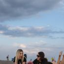 Claudia Romani – With Babe Marta on the beach shows support AC Milan in Miami - 454 x 681