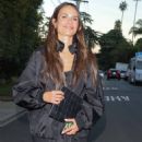 Jordana Brewster – Wearing a black bomber jacket at Fundación Tijuana Sin Hambre in Brentwood