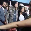 Kourtney Kardashian – With Travis Barker attend Machine Gun Kelly’s concert in Inglewood