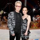 China Chow and Billy Idol attend the Moschino Spring/Summer 19 Menswear and Women's Resort Collection at Los Angeles Equestrian Center on June 8, 2018 in Burbank, California - 399 x 600