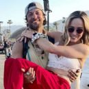 Caity Lotz and Kyle Schmid