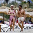 Vogue Williams – Spotted in a pink bikini on the Ibiza beach - 454 x 326