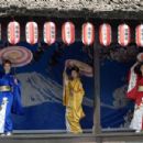 Zhao Tao as Tao (center) and fellow performers at World Park in THE WORLD