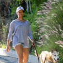 Regina King – Takes her dog out for a walk in Los Angeles