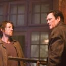 Reynaldo Rosales (left, 'Jack Singleton') and Michael Madsen (right, 'Officer Lawdale') star in Lionsgate Home Entertainment's House. - 454 x 301