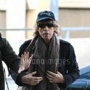 Mick Jagger departs LAX airport - 8 December 2009