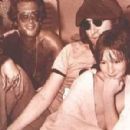 Dec 27, 1974 John Lennon and May Pang in Palm Springs, Florida, after their visit at Disneyworld - 454 x 299