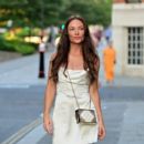 April Banbury – Arriving at Kiss Summer Soiree 2.0 at Sabine Rooftop Bar in London - 454 x 394