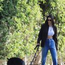 Kendall Jenner – With her Doberman Pinscher out for a walk in Beverly Hills