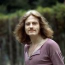 John Paul Jones poses in the garden of his home in Hertfordshire, England on 25 July, 1970 - 454 x 473