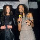 Katie Holmes and Ananda Lewis - MTV New Year's Eve 1998