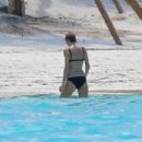 Taylor Swift – Spotted in a Bikini at a Beach in The Bahamas