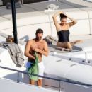 Selena Gomez – In a swimsuit on a yacht during her birthday vacation in Positano