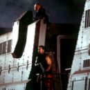 Clea DuVall as Bashira Kincaid and Ice Cube as James 'Desolation' Williams hunt for Martian ghosts in Screen Gems' John Carpenter's Ghosts of Mars - 2001