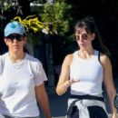 Alison Brie – Enjoys a walk with a friend in Los Angeles - 454 x 628