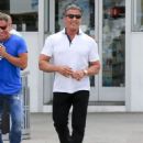 Sylvester Stallone goes for a stroll with friends in Beverly Hills on April 6, 2016